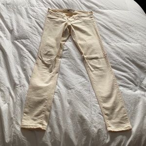 Cream fitted/skinny jeans